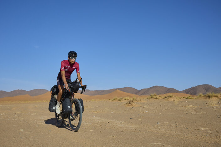 Flurin Leugger while bikepacking in the Sahara Desert in Morocco